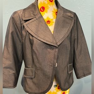 Silver/Gray suit jacket.